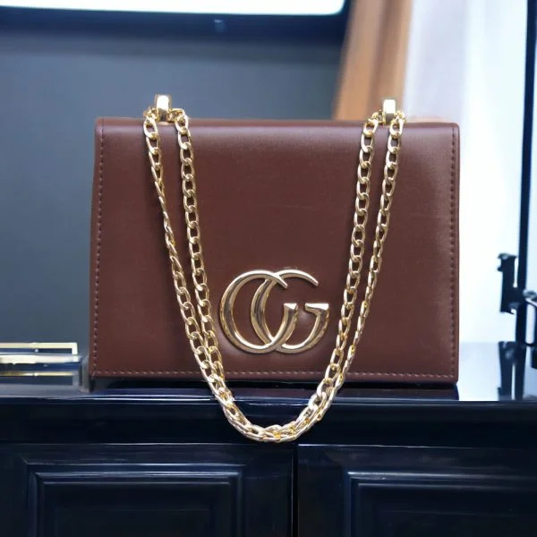 Sway in Style: Elevate Your Look with the CG Leather Long Chain Handbag! 👜